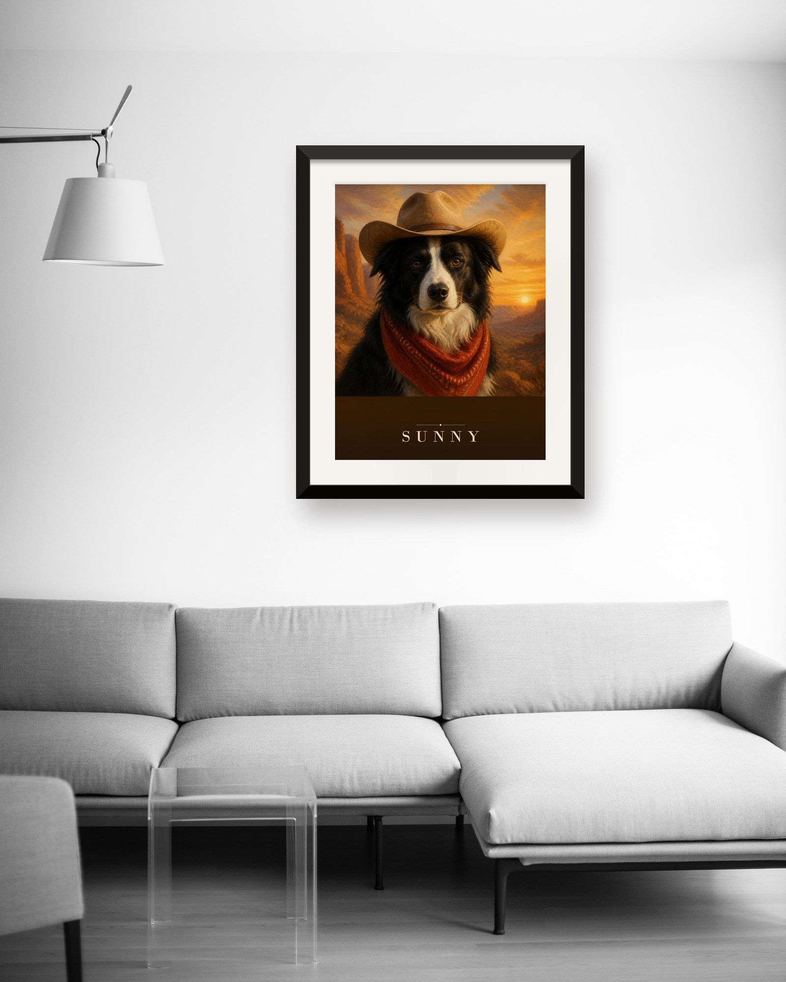 The printed portrait in a black frame above a light gray sofa (frame not included)