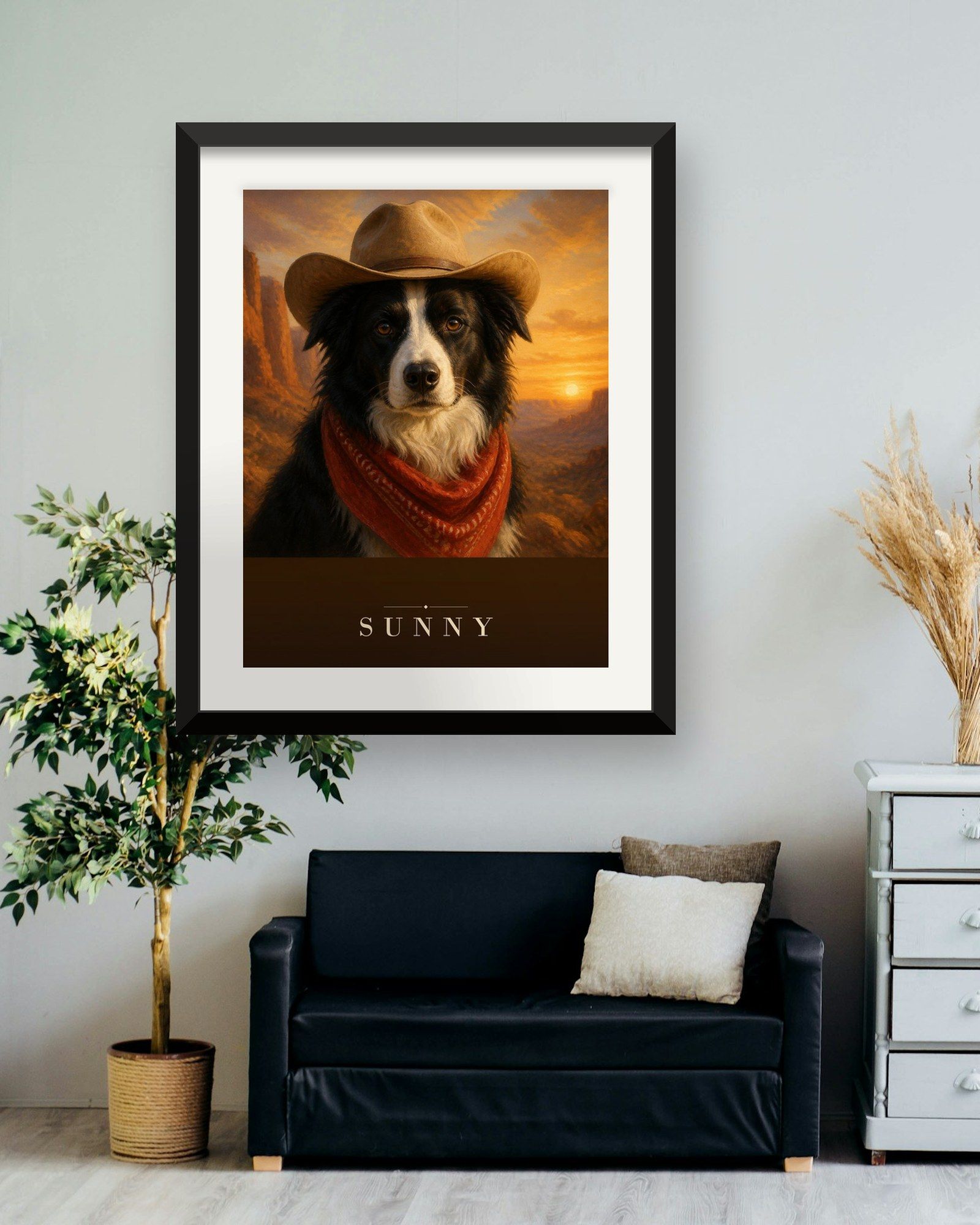 The printed portrait in a black frame above a dark sofa next to a white dresser (frame not included)