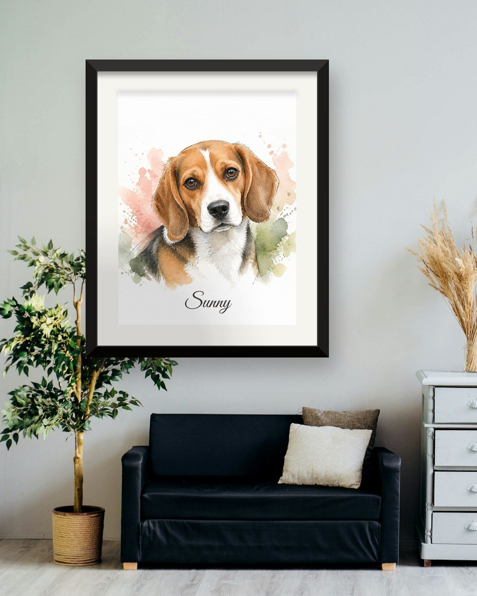 The printed portrait in a black frame above a dark sofa next to a white dresser (frame not included)